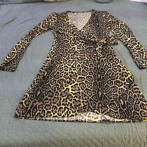 Yellow leopard wrap around dress. In mint condition. BCBG brand